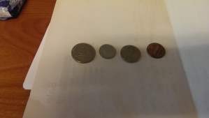 From left to right: Quarter dollar, ten cents, five centy, one cent